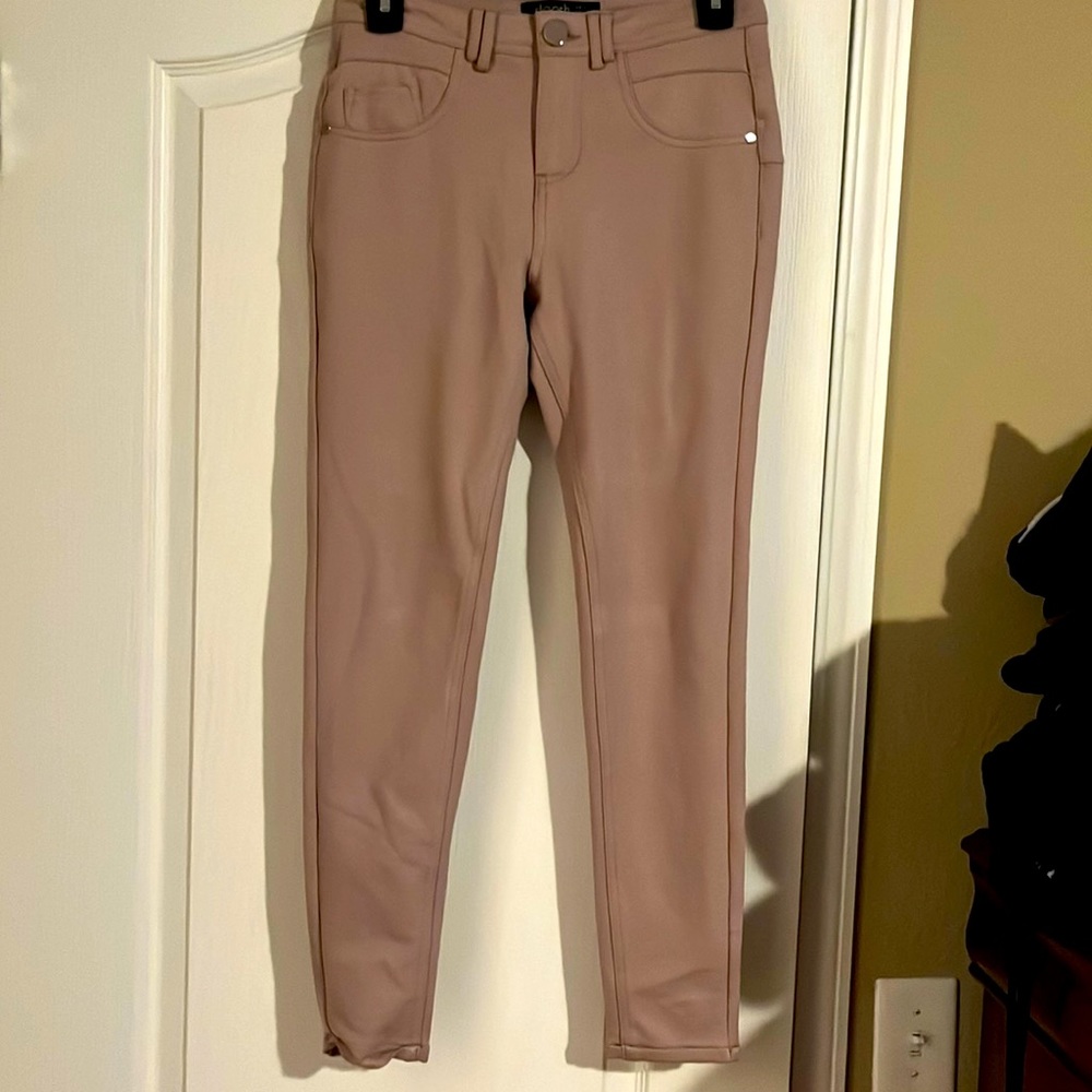 Brand: Stoosh  Skinny jeggings with no front pockets.